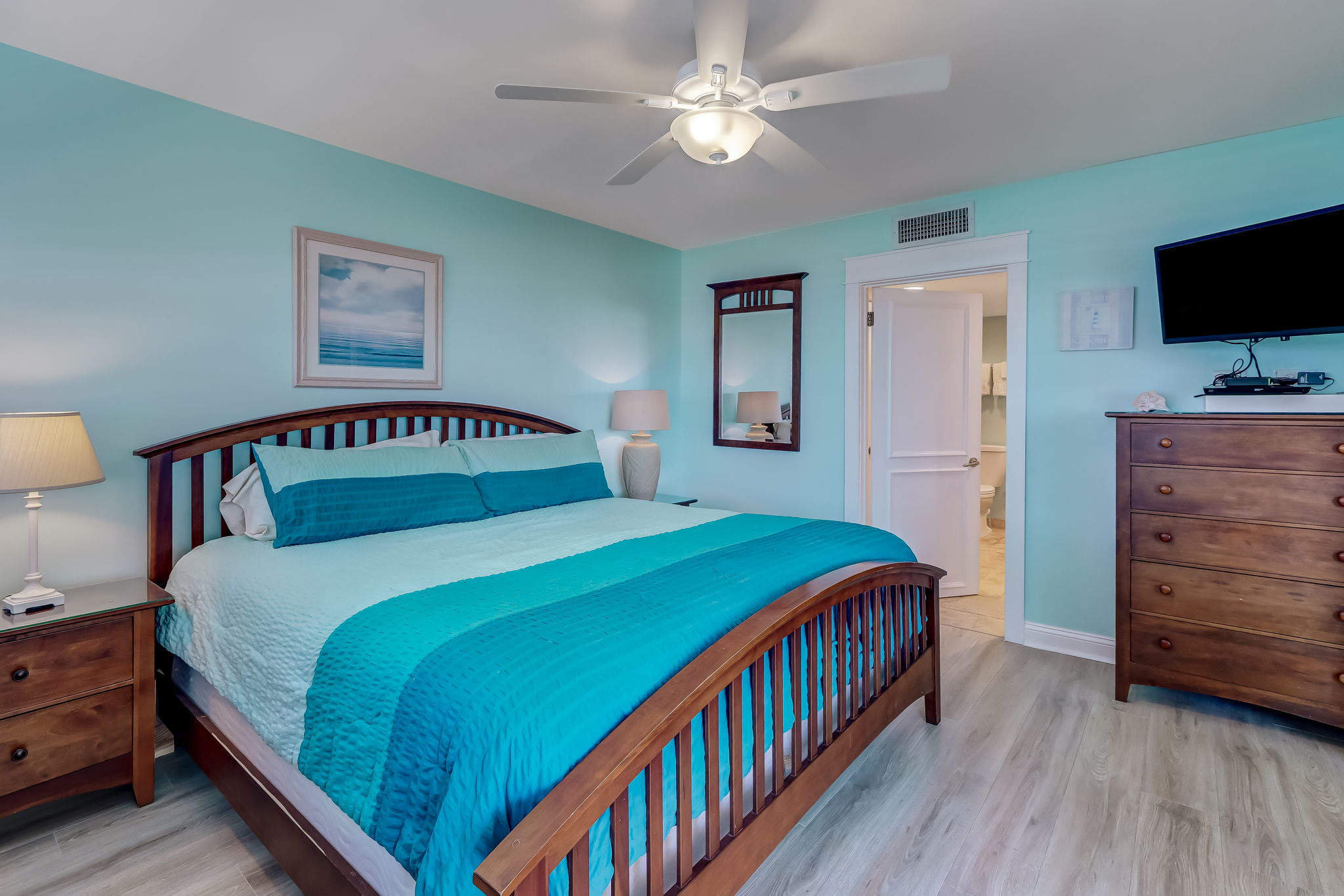 Master bedroom with coastal teal walls